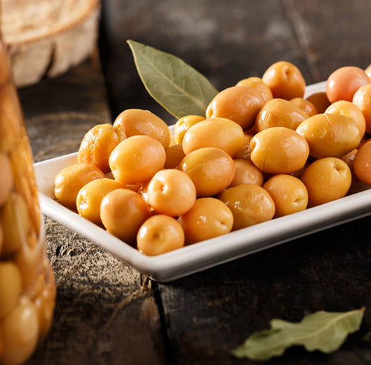 Ikram scratched green olives per lb